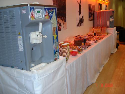 Twin ice cream machines and sweets table