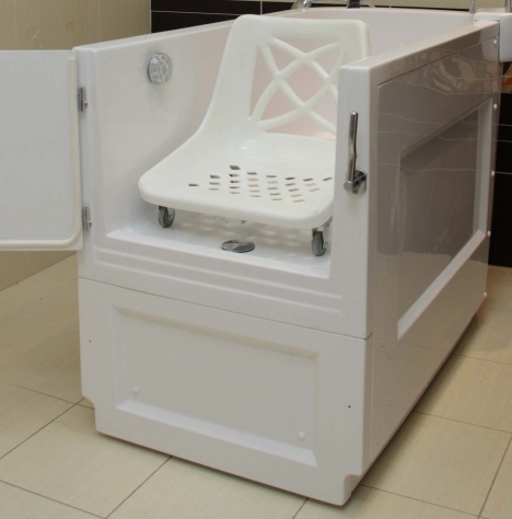 Raised slide in bath, comes in various colours for Paediatric market