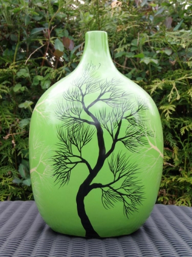 Ceramic green vase with tree motif