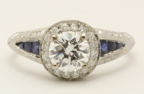 1 00ct Round Diamond Colour D Clarity SI2 in 18ct white gold sapphire and diamond set mount - £6,750:00