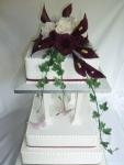 Three Tier Royal Iced Wedding Cake with Hand Made Arum Lilies And Victorian Roses