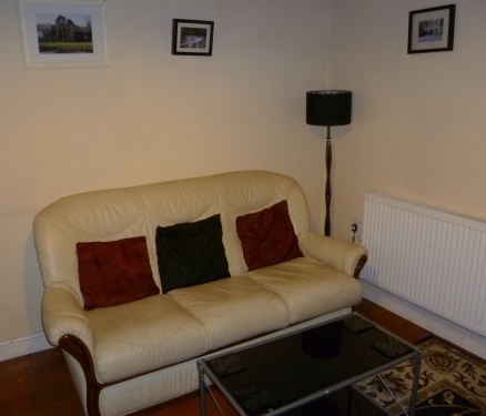 Lounge view showing 3 seater settee