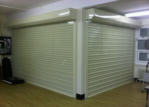 QS75 Glavanised Steel Shutters Powder Coated Light Green (Installed in Cheshire)